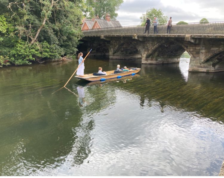 Punt approaching the Great Bridge at Fordingbridge during Fordingbridge Museum's 25th Anniversary celebrations